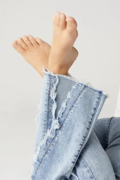 EVERSTRETCH FLARE JEANS WITH CROSSOVER FRINGE 11 EVERSTRETCH FLARE JEANS WITH CROSSOVER FRINGE -Simply Devine Gifts And Decor Shop 2419301A 5