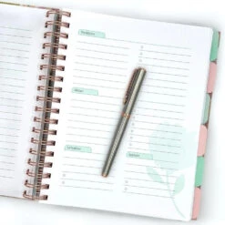 Declutter Like A Mother Planner: A Guilt-Free, No-Stress Way To Transform Your Home And Your Life -Simply Devine Gifts And Decor Shop 9781400334971.lifestyle.IN03 590x590 2x 1d84f697 126e 412c 8c43 bd1157b4a307