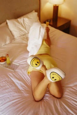 White Fuzzy Happy Face Slippers -Simply Devine Gifts And Decor Shop self care day fuzzy slippers